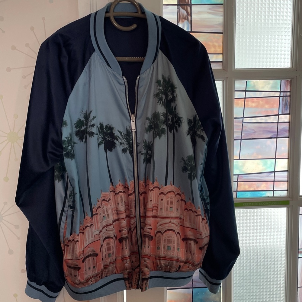 Colourful reversible bomber jacket.